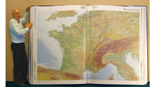 Illustration for article titled World's Largest Atlas Needs Two People To Turn Each Page
